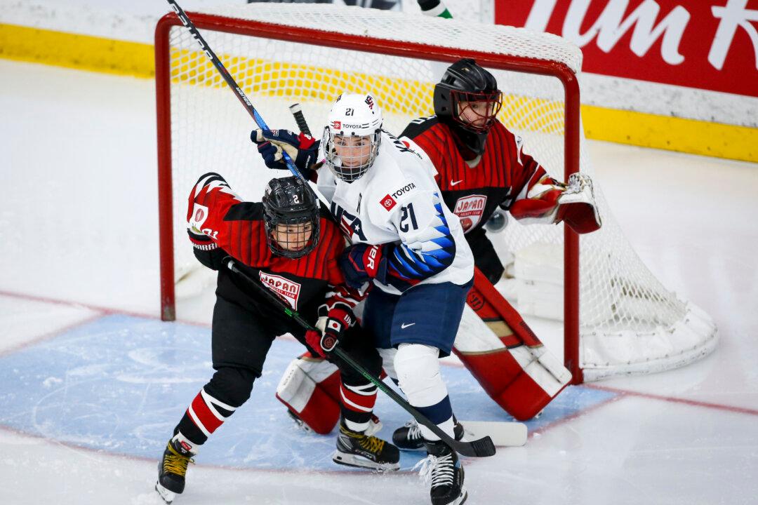 Knight Breaks US Record in 10–2 Quarterfinal Win Over Japan