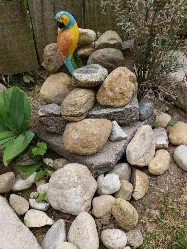 Display author made in her back yard with rocks and a ceramic bird. (Photo by Donna Martelli)