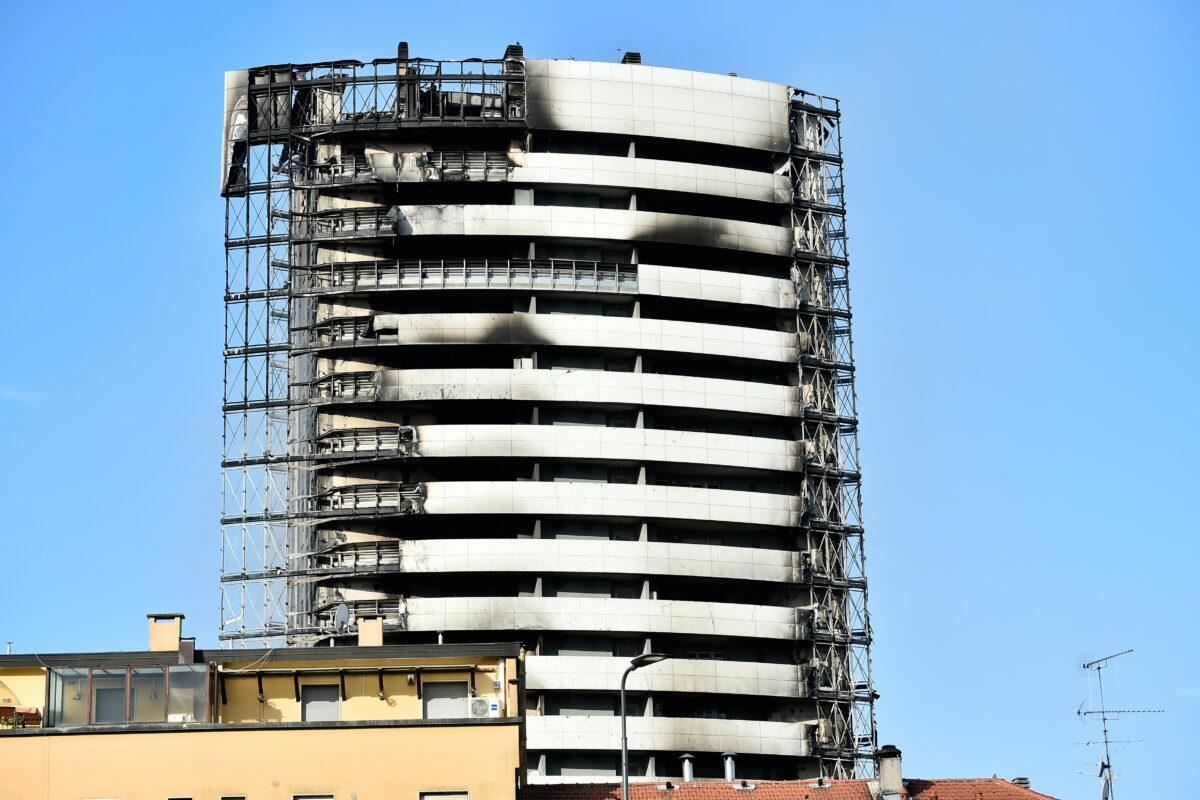 Blackened ruins of a block of flats are seen after a fire ripped through the building, in Milan, Italy, on Aug. 30, 2021. (Flavio Lo Scalzo/Reuters)