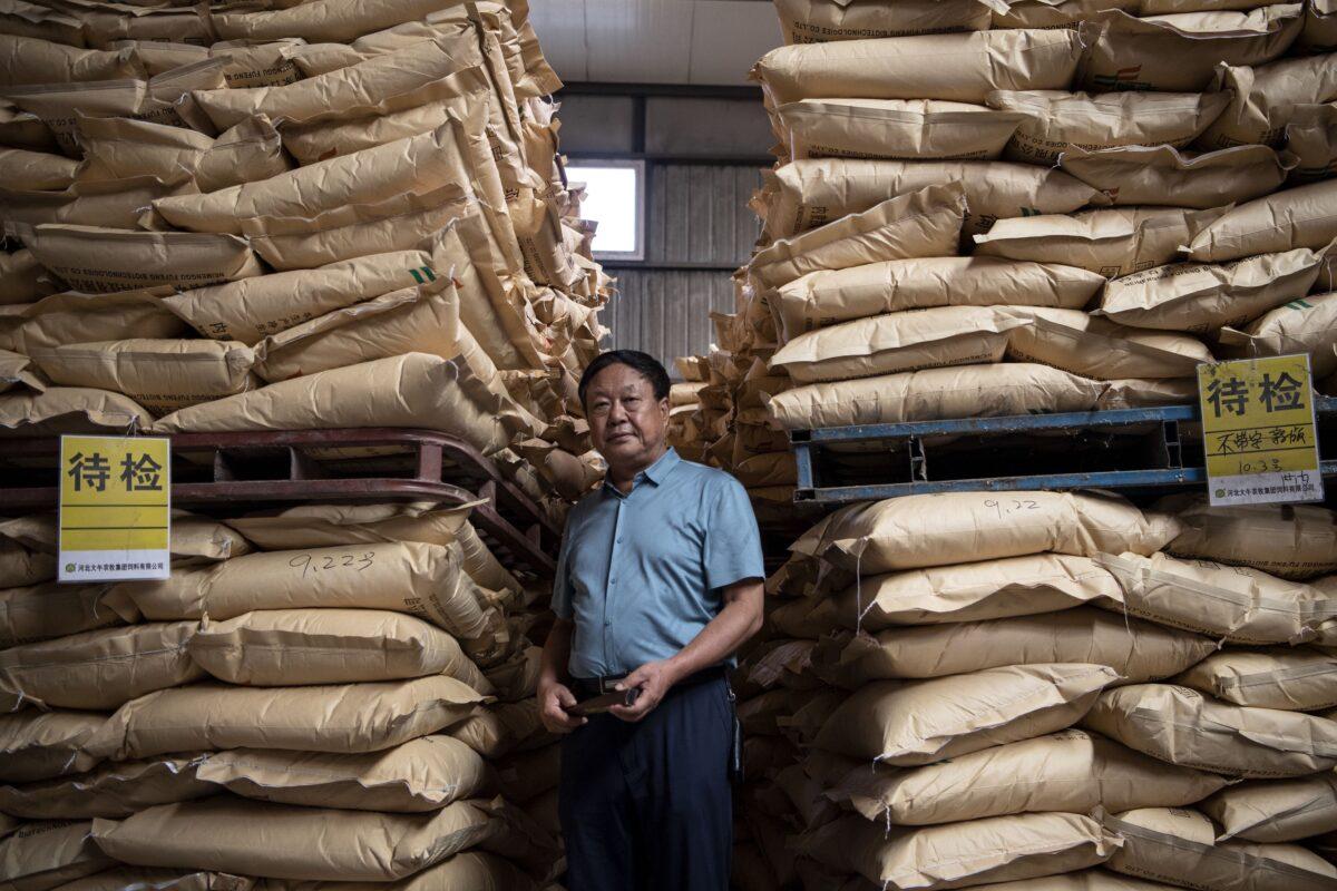 Chinese pig farmer Sun Dawu posing at a feed warehouse in Hebei, outside of Beijing, on Sept. 24, 2019. (Noel Celis/AFP via Getty Images)