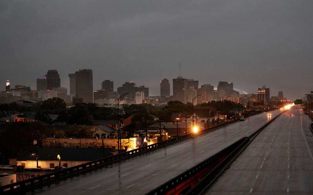 Few motorists travel on the 1-10 ahead of the arrival of Hurricane Ida in New Orleans, on Aug. 29, 2021. (David Grunfeld/The Advocate via AP)