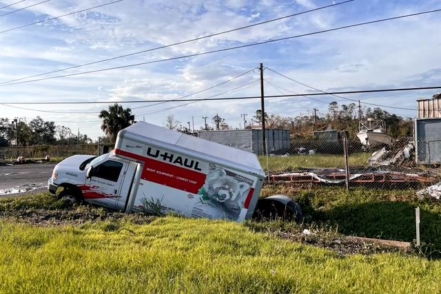 A UHaul truck lies in a ditch after Hurricane Ida swept through, in LaPlace, La., on Aug. 31, 2021. (Charlotte Cuthbertson/The Epoch Times)