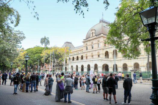 A general view of people gathering outside Parliament House during an anti-lockdown protest in Brisbane, Australia, on Aug. 31, 2021. (AAP Image/Russell Freeman)