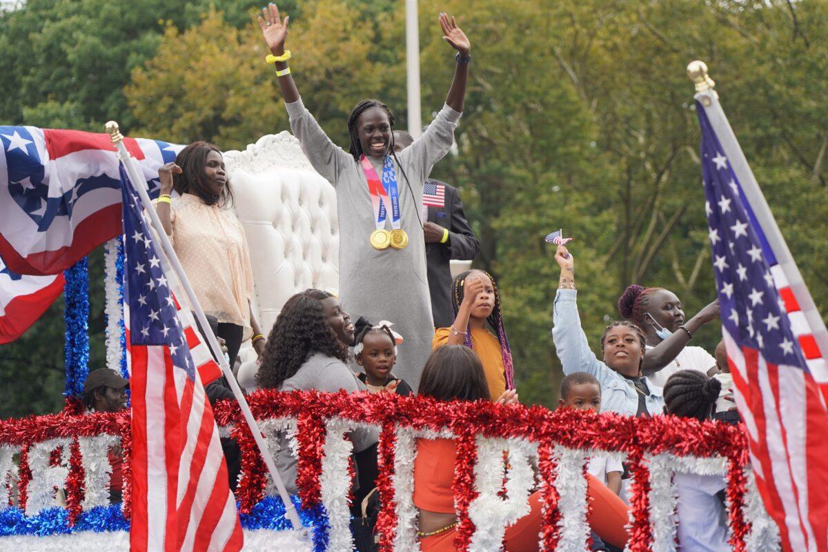 Olympic gold medalist Athing Mu is honored with a hometown parade in Trenton, N.J., on Aug. 29, 2021. (Lily Sun/The Epoch Times)