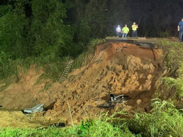 State troopers along with various other agencies at the scene of a road collapse on Highway 26 near Crossroads Road in George County, Miss., on Aug. 31, 2021. (Courtesy of Mississippi Highway Patrol)