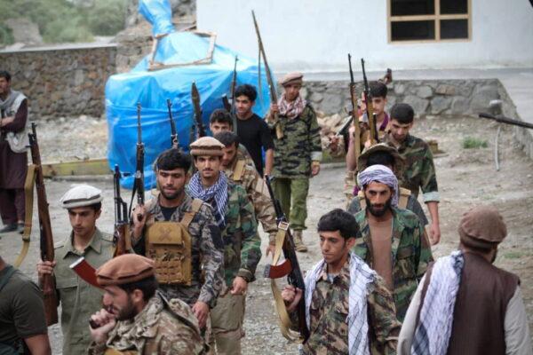 Men prepare for defense against the Taliban in Panjshir, Afghanistan, on Aug.22, 2021. (Aamaj News Agency via Reuters)