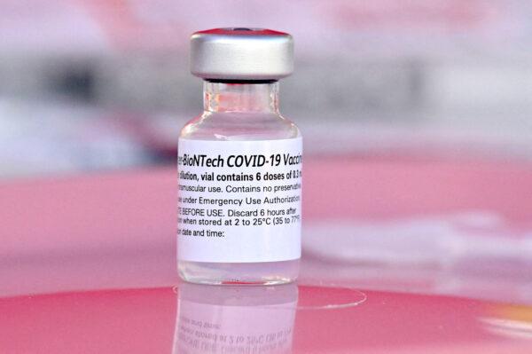 A vial of Pfizer-BioNTech COVID-19 vaccine is seen at a popup vaccine clinic in the Arleta neighborhood of Los Angeles, Calif., on Aug. 23, 2021. (Robyn Beck/AFP via Getty Images)