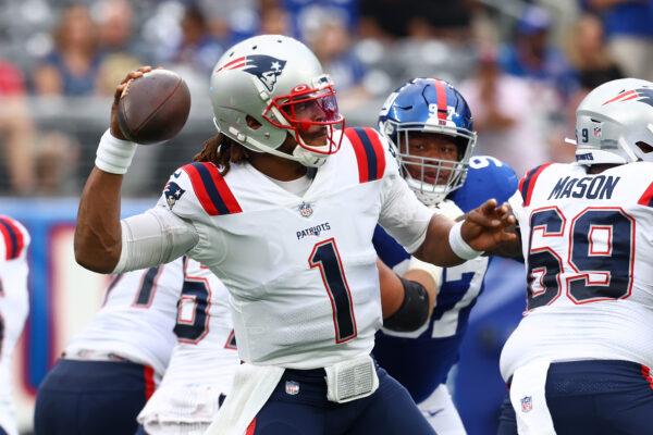 Cam Newton #1 of the New England Patriots looks to pass the ball against the New York Giants at MetLife Stadium in East Rutherford, New Jersey on Aug. 29, 2021. (Mike Stobe/Getty Images)