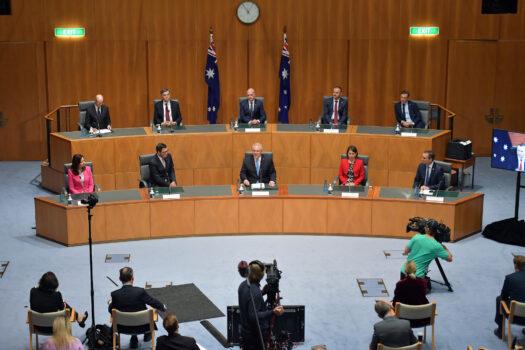  Former Australian Prime Minister Scott Morrison (centre) together with then-state premiers and chief ministers, address the media in the Main Committee Room at Parliament House in Canberra, Australia, on Dec. 11, 2020. (Sam Mooy/Getty Images)