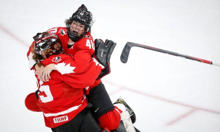 Poulin Scores in Overtime, Canada Wins First World Title Since 2012