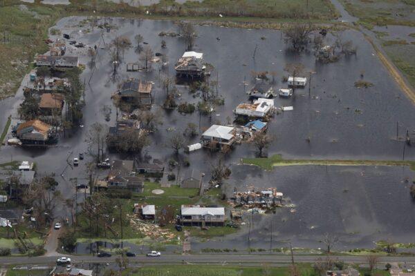 An aerial view shows destroyed houses in a flooded area after Hurricane Ida made landfall in Louisiana, in Montegut, La., on Aug. 31, 2021. (Marco Bello/File/Reuters)