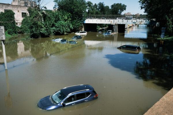 Cars sit abandoned on the flooded Major Deegan Expressway following a night of extremely heavy rain from the remnants of Hurricane Ida in the Bronx borough of New York City on Sept. 2, 2021. (Spencer Platt/Getty Images)