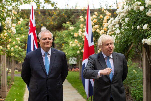 Prime Minister Boris Johnson with Australian Prime Minister Scott Morrison in the garden of 10 Downing Street, London, UK, on June 15, 2021. (Dominic Lipinski/PA)