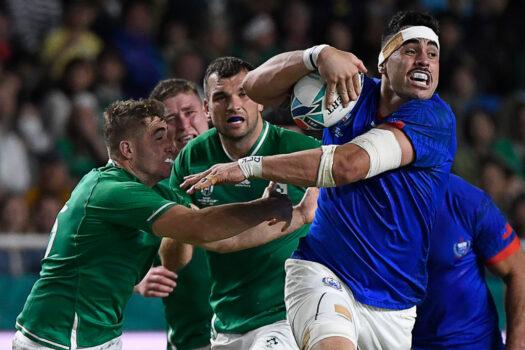 Samoa's lock Kane Le'aupepe fends off a tackle by Ireland's full-back Jordan Larmour (L) during the Japan 2019 Rugby World Cup Pool A match between Ireland and Samoa at the Fukuoka Hakatanomori Stadium in Fukuoka on Oct. 12, 2019.(Christophe Simon/AFP via Getty Images)