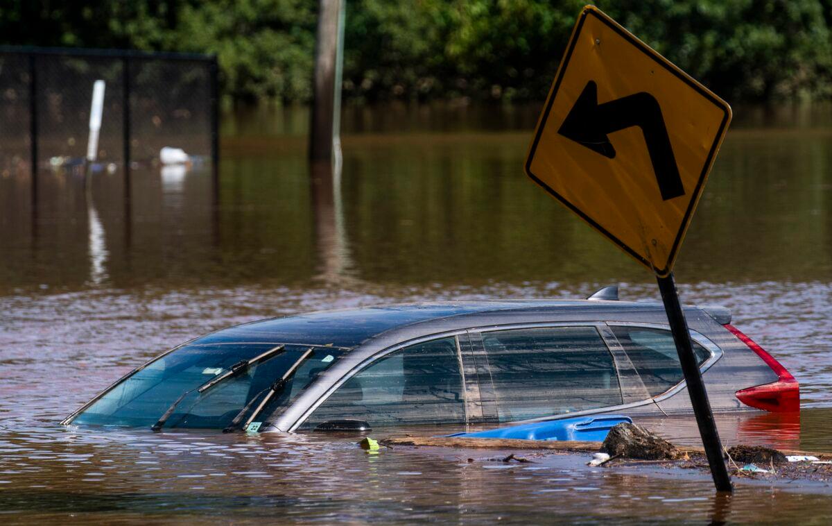 A car flooded on a local street as a result of the remnants of Hurricane Ida, in Somerville, N.J., on Sept. 2, 2021. (Eduardo Munoz Alvarez/AP Photo)