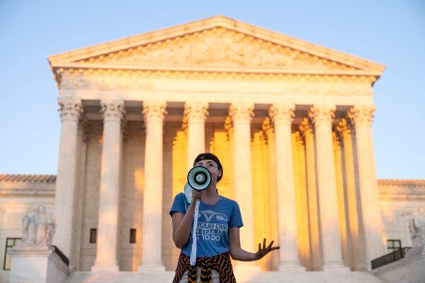 An activist speaks outside the Supreme Court in protest against the Texas abortion law in Washington on Sept. 2, 2021. (Drew Angerer/Getty Images)