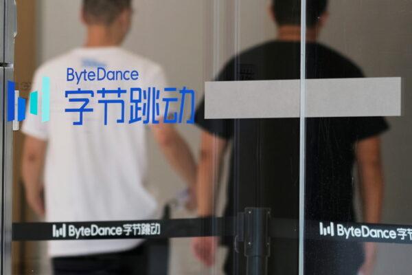 People walk past a logo of Bytedance, the China-based company which owns the short video app TikTok, or Douyin, at its office in Beijing, on July 7, 2020. (Thomas Suen/File Photo/Reuters)