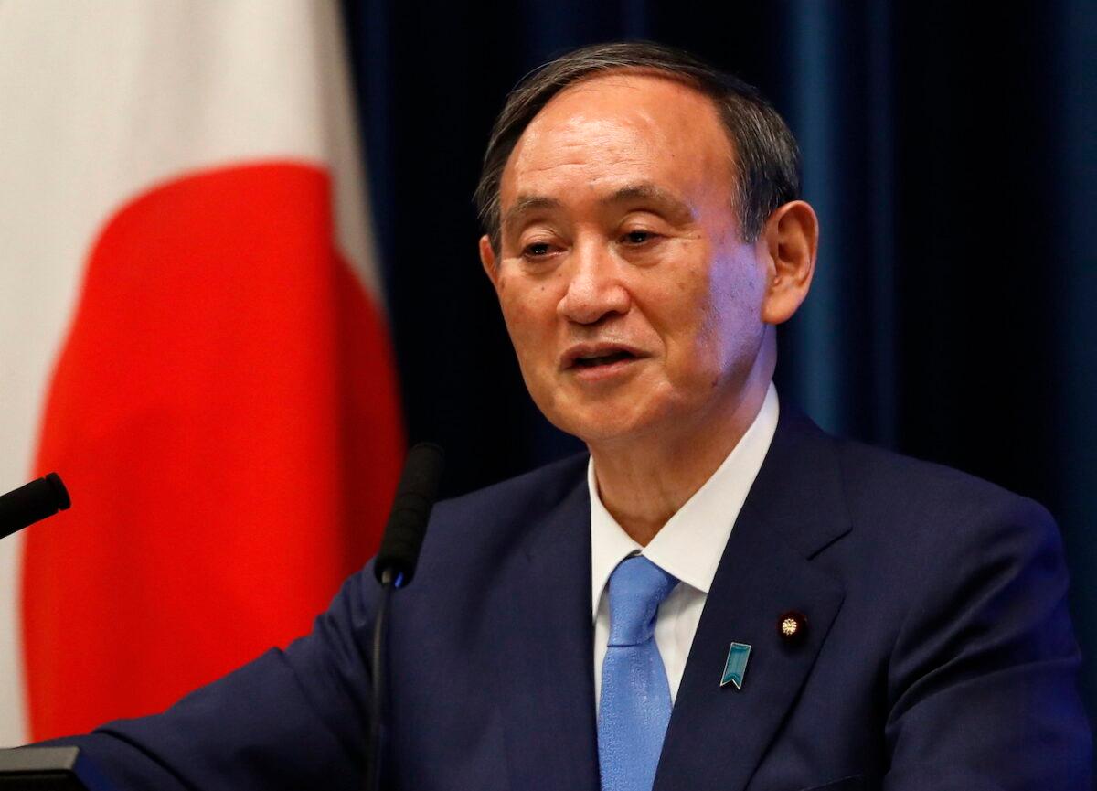 Japan's then-Prime Minister Yoshihide Suga attends a news conference at his official residence in Tokyo, Japan, on June 17, 2021. (Issei Kato/POOL/Getty Images)