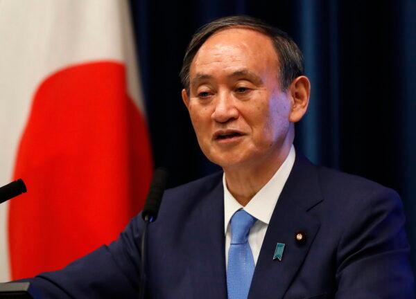 Japan's Prime Minister Yoshihide Suga attends a news conference at his official residence in Tokyo, Japan on June 17, 2021. (Issei Kato/Pool/Getty Images)