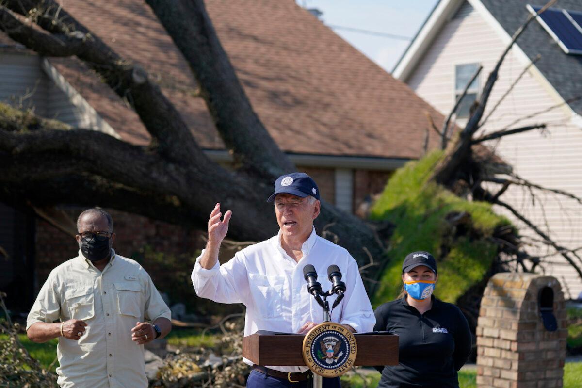 President Joe Biden talks as he tours a neighborhood impacted by Hurricane Ida, in LaPlace, La., on Sept. 3, 2021. (AP Photo/Evan Vucci)