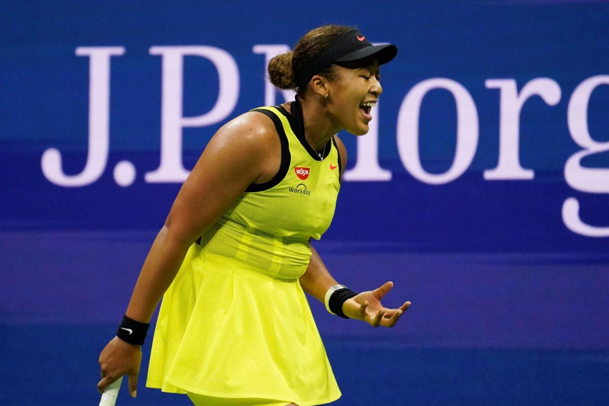 Naomi Osaka, of Japan, reacts during a match against Leylah Fernandez, of Canada, at the third round of the US Open tennis championships, N.Y., on Sept. 3, 2021. (John Minchillo/AP Photo)