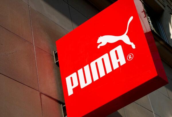 The logo of German sports goods firm Puma is seen at the entrance of one of its stores in Vienna, Austria on March 18, 2016. (Leonhard Foeger/Reuters)
