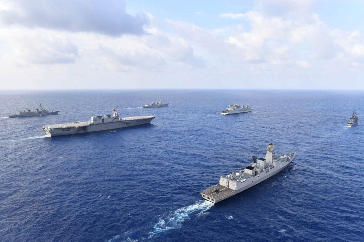Naval vessels from the United States, Japan, India, and the Philippines conduct formation exercises and communication drills in the South China Sea, on May 2019. (Japan Maritime Self-Defense Force/U.S. Navy)