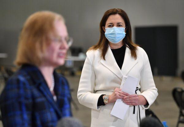 Queensland Premier Annastacia Palaszczuk (R) looks on as Queensland Chief Health Officer Dr Jeannette Young (L) speaks during a press conference in Brisbane, Australia, on Aug. 9, 2021. (AAP Image/Darren England)