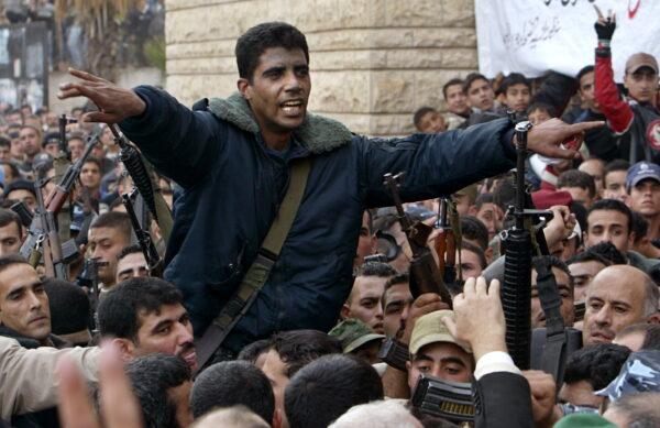 Palestinian commander of the Israeli-designated terrorist group Al Aqsa Martyrs Brigades Zakaria Zubeidi is carried on the shoulders of supporters in Jenin, in the Israeli-occupied West Bank on Dec. 30, 2004. (Ammar Awad/Reuters)