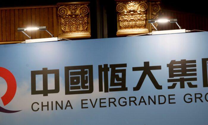 China Evergrande Bonds Suspended as Prices Slump