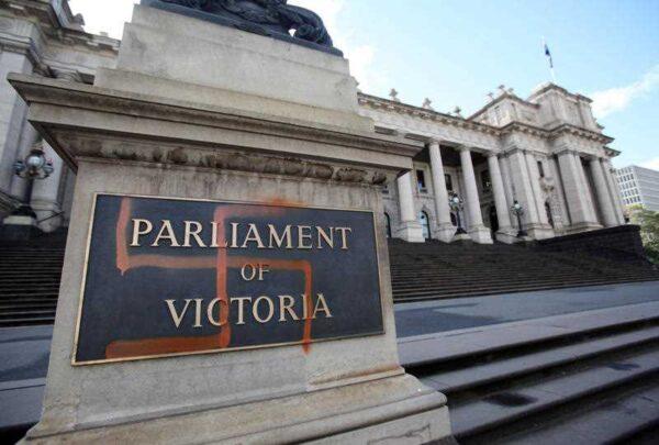A swastika is seen graffitied on the front of the Victorian State Parliament, in Melbourne, Australia, on Oct. 1, 2012 (AAP Image/David Crosling)