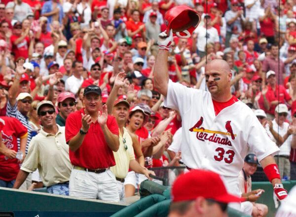 St. Louis Cardinals' Larry Walker is applauded by fans after his fifth-inning, three-run home run against the Houston Astros in St. Louis, Mo., on July 16, 2005. (Kyle Ericson/AP Photo)