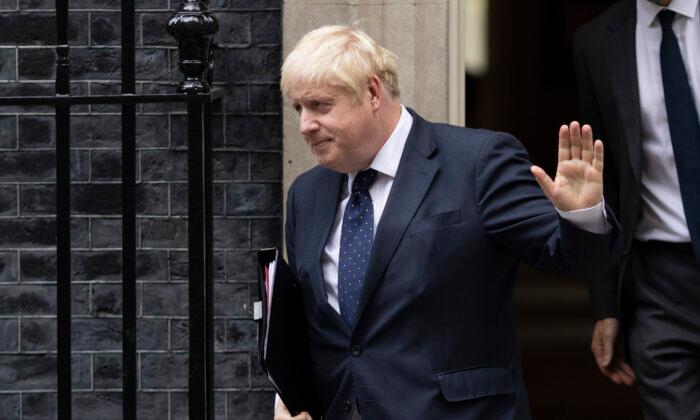 UK’s Johnson Raises Tax to Fund Social Care, Breaking Election Pledge