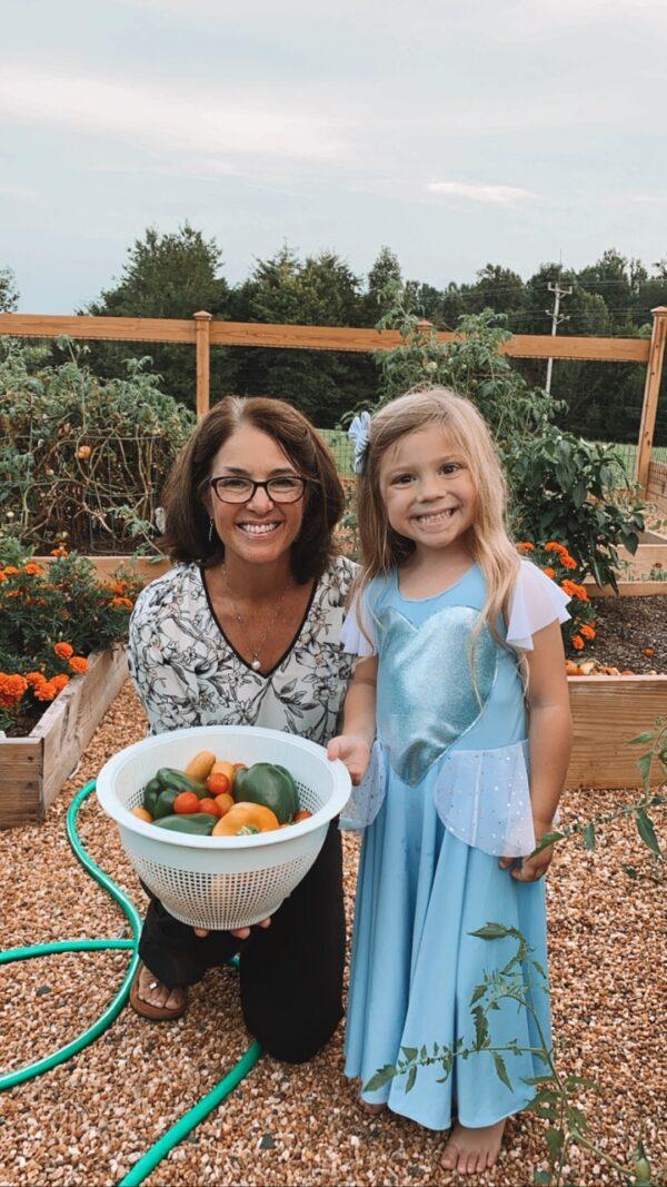 Cindy Legg loves gardening and particularly sharing the harvest with granddaughter Brooklynn. (Courtesy of Cindy Legg)