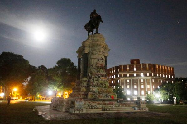 The moon illuminates the statue of Confederate General Robert E. Lee on Monument Avenue in Richmond, Va., on June. 5, 2020. (Steve Helber/AP Photo)