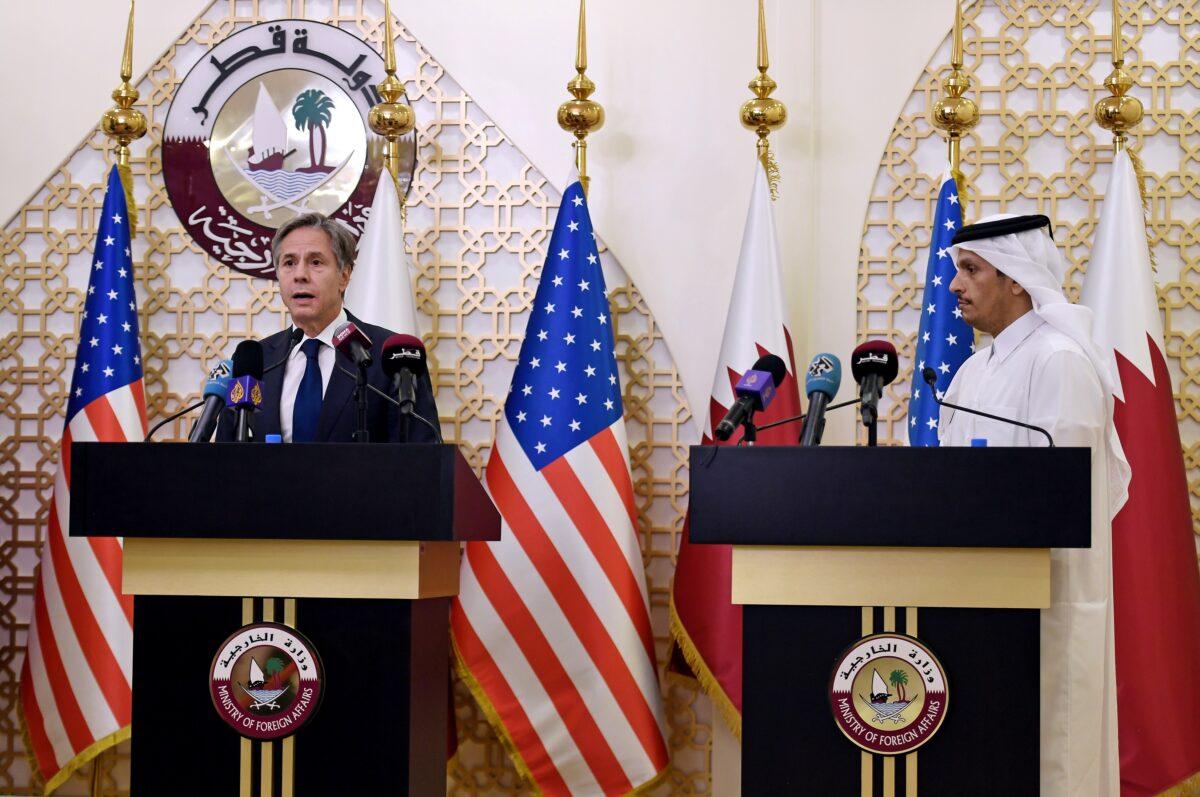 U.S. Secretary of State Antony Blinken and Qatari Deputy Prime Minister and Foreign Minister Mohammed bin Abdulrahman Al Thani hold a joint news conference at the Ministry of Foreign Affairs in Doha, Qatar on Sept. 7, 2021. (Olivier Douliery/Pool via Reuters)