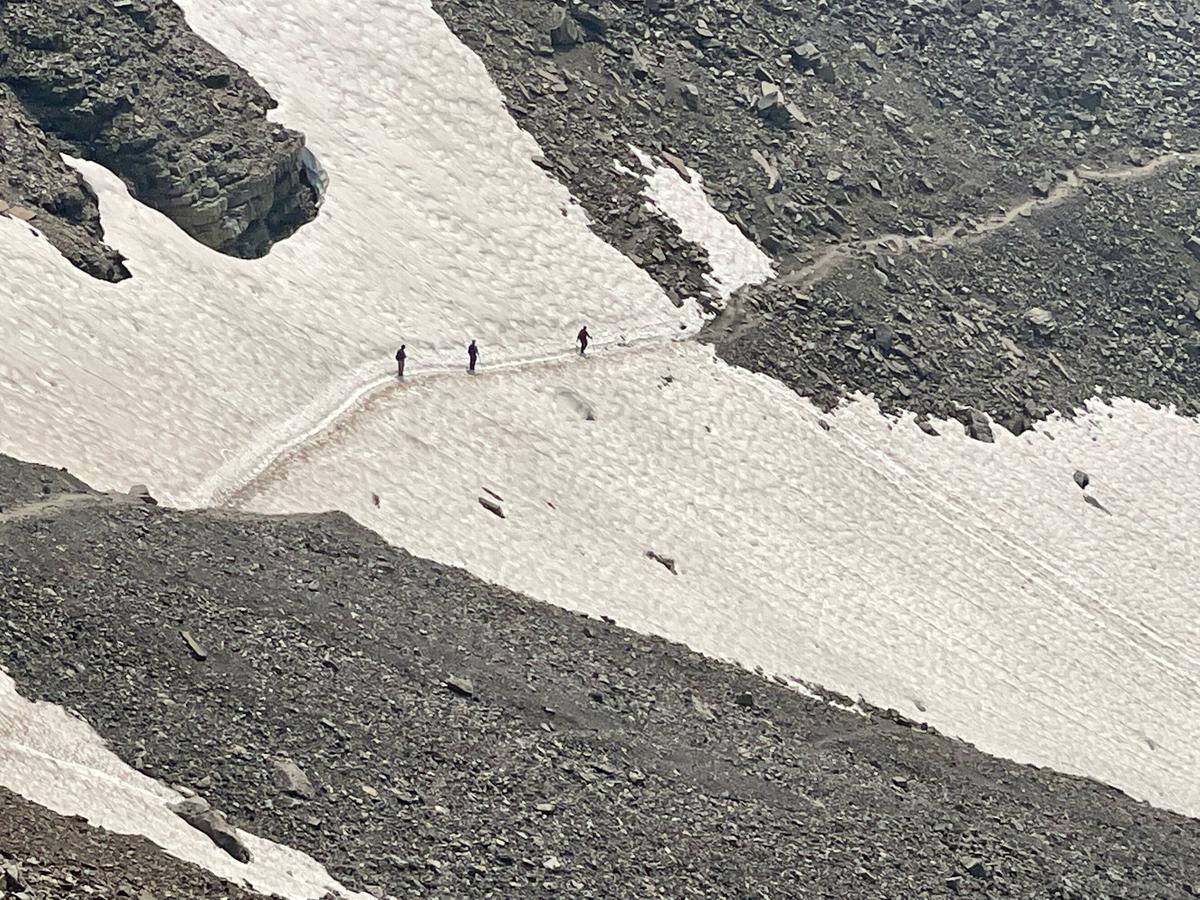 Crossing the snowfield en route to and returning from Sentinel Pass. (Tami Ellis)