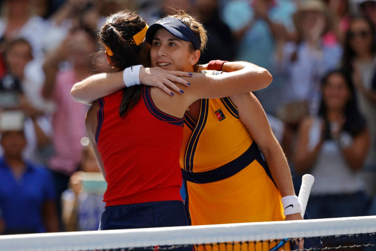 Emma Raducanu of Great Britain (L) hugs Belinda Bencic of Switzerland (R) after their match on day ten of the 2021 U.S. Open tennis tournament at USTA Billie Jean King National Tennis Center, Flushing, N.Y., on Sept. 8, 2021. (Geoff Burke-USA TODAY Sports/Reuters)