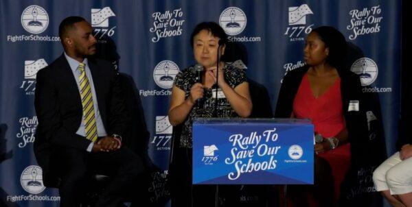 Xi Van Fleet (C) speaks at the “Rally to Save Our Schools” event in Lansdowne Resort and Spa, Leesburg, Va., on Sept. 8, 2021. (Facebook/Screenshot via The Epoch Times)