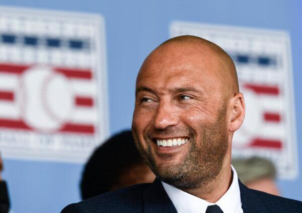Hall of Fame inductee Derek Jeter of the New York Yankees watches a video during an induction ceremony at the Clark Sports Center at the National Baseball Hall of Fame, in Cooperstown, N.Y., on Sept. 8, 2021. (Hans Pennink/AP Photo)