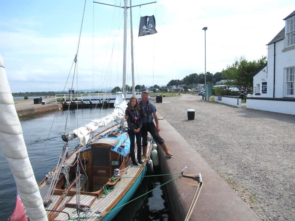 Katie with her father, David, and her boat Falanda. (Courtesy of <a href="https://www.facebook.com/falanda.sailing">Katie McCabe</a>)