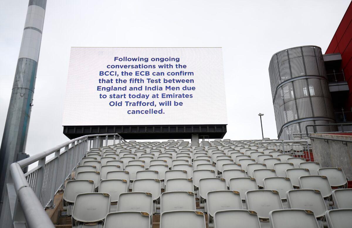 A message is seen displayed on a big screen after the match was cancelled due to members of the India staff contracting COVID-19, in Emirates Old Trafford, Manchester, Britain, on Sept. 9, 2021. (Jason Cairnduff/Action Images via Reuters)