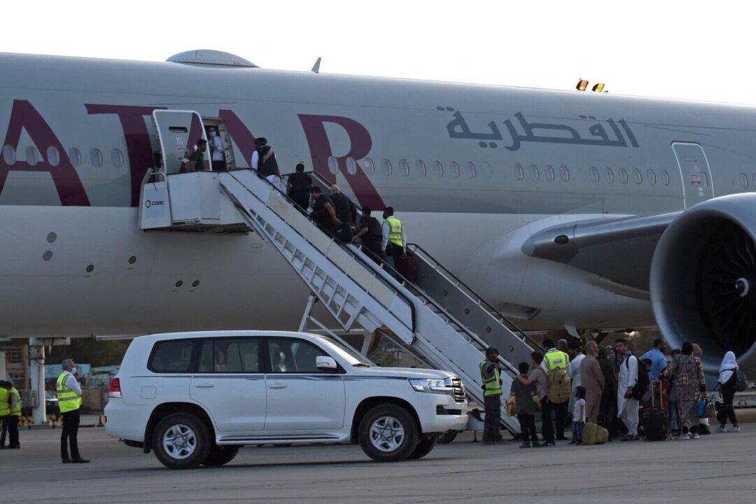 Plane Carrying Afghans, US, and European Citizens From Kabul Arrives in Doha