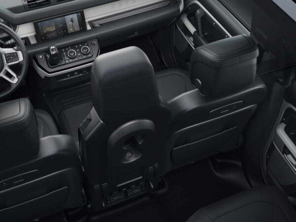 Center console folds up into a jump seat. (Courtesy of Land Rover)