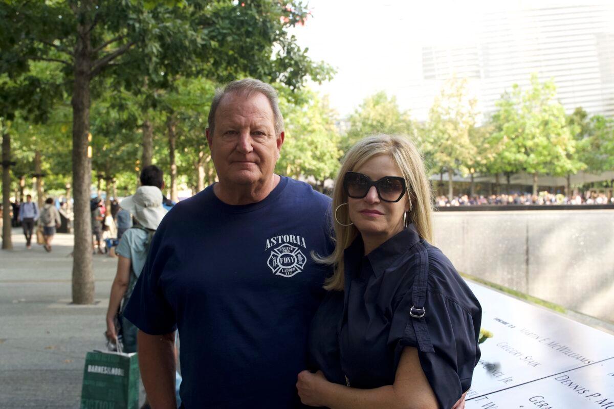 First responder during 9/11 Dave Lohl with his wife at the World Trade Center memorial site in Manhattan, New York, on Sep. 10, 2021 (Enrico Trigoso/The Epoch Times)