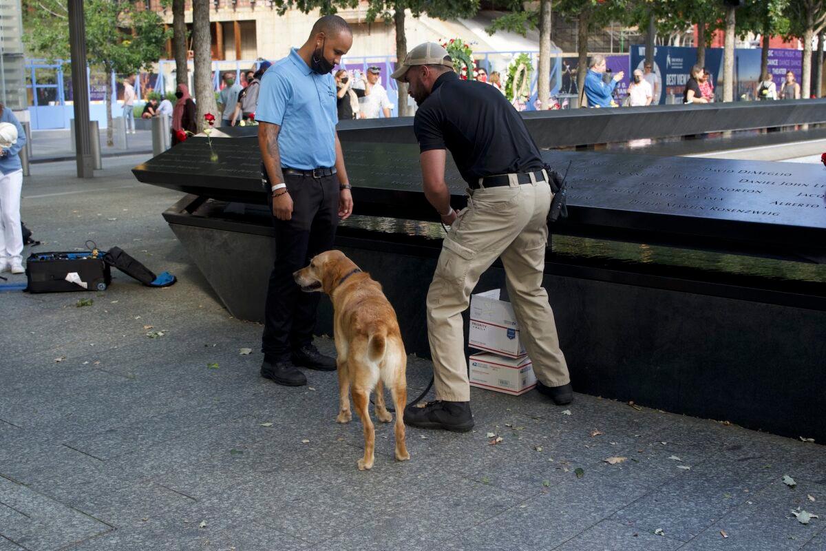 NYPD officers inspect suspicious boxes at the World Trade Center memorial site in Manhattan, New York, on Sep. 10, 2021 (Enrico Trigoso/The Epoch Times)