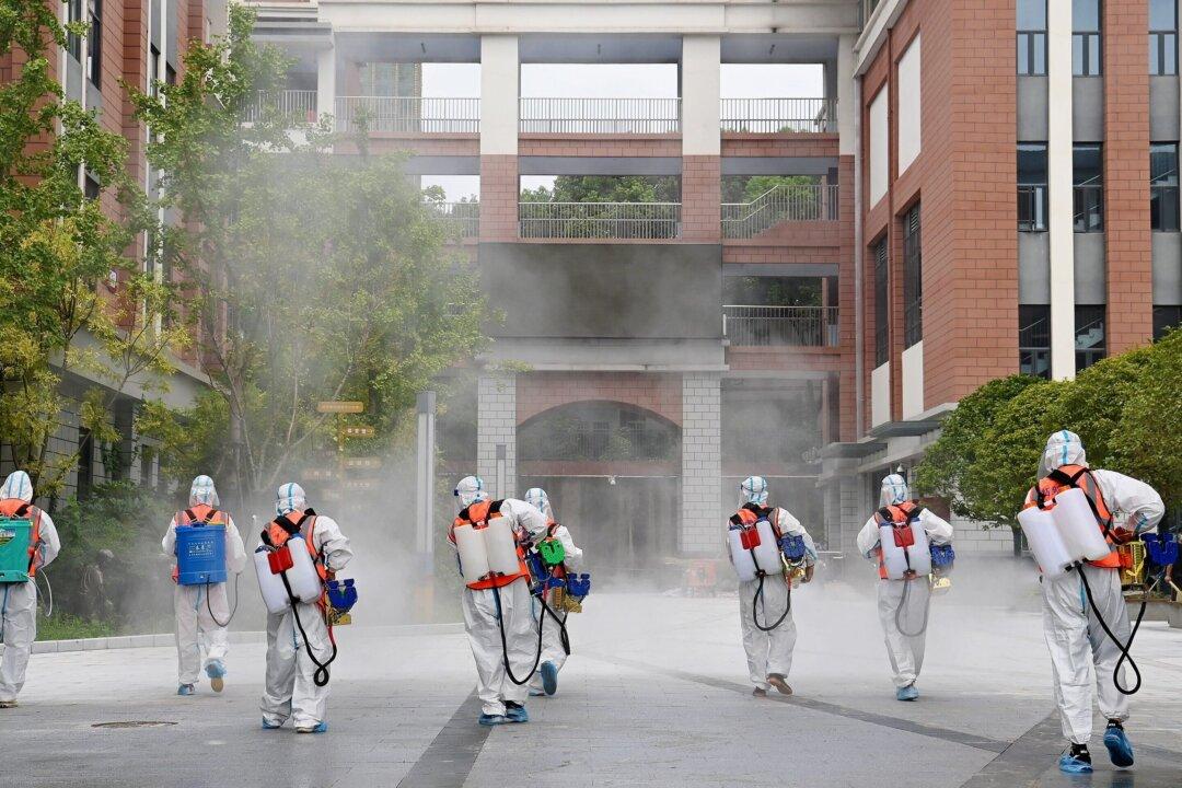 Chinese City With COVID-19 Outbreak Stops Buses, Trains