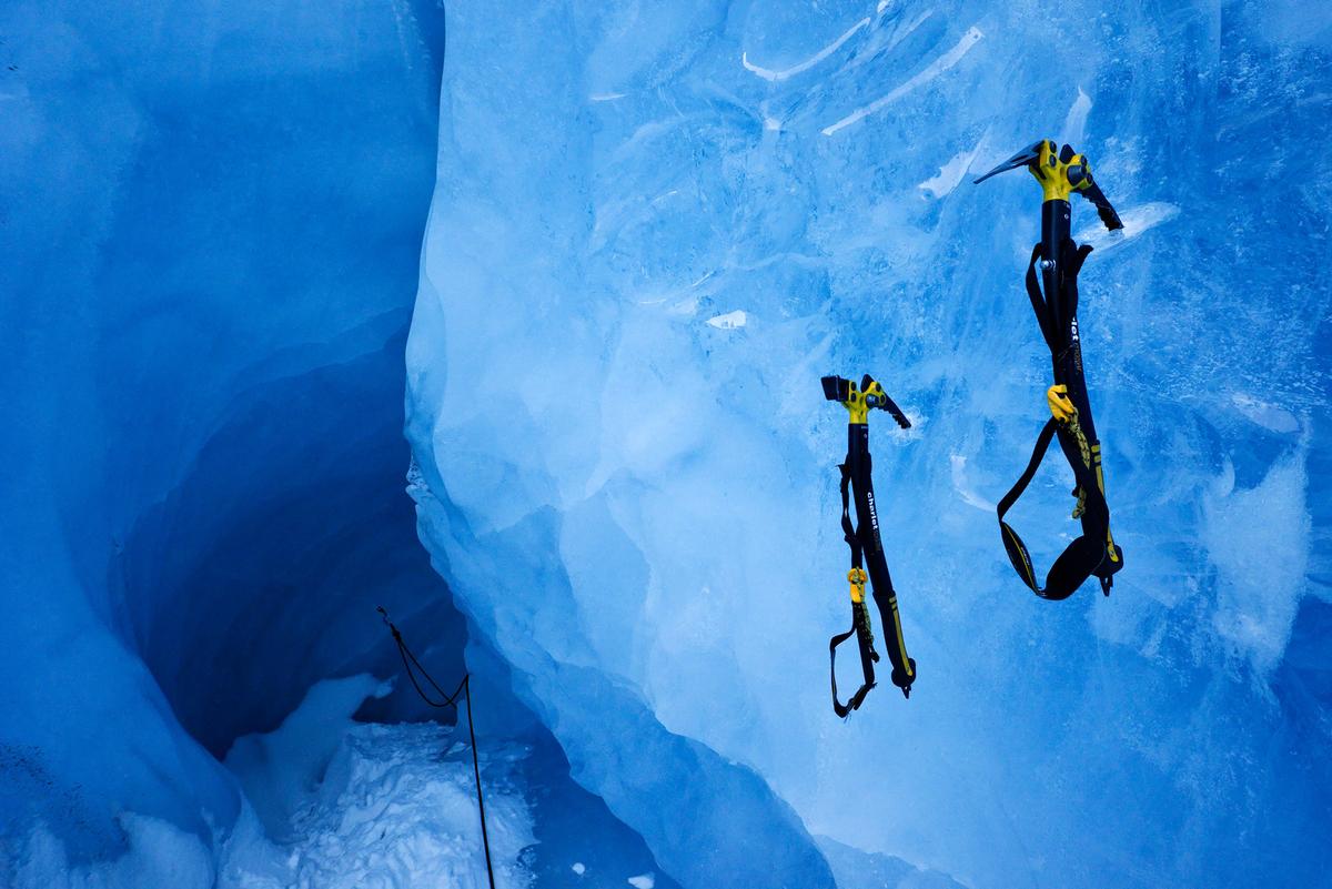 Close-up shot of climbing tools on the ice cave wall. (Courtesy of Caters News)