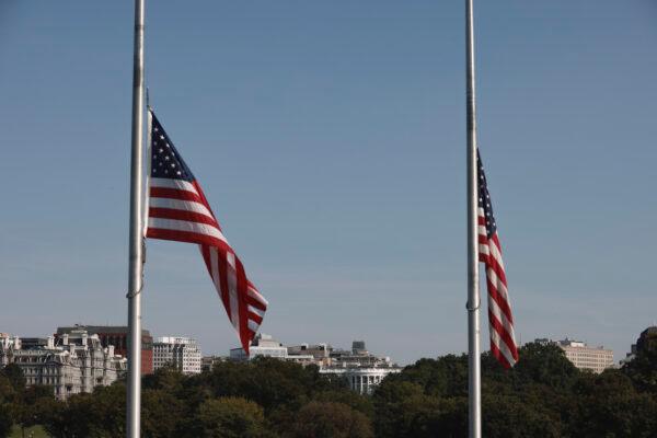 The White House is seen from the Washington Monument as flags are flown at half-staff on Sept. 11, 2021. (Anna Moneymaker/Getty Images)