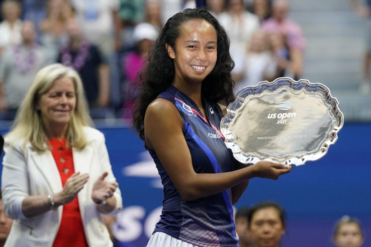 Leylah Fernandez, of Canada, holds up the runner-up trophy after losing to Emma Raducanu, of Britain, during the women's singles final of the U.S. Open tennis championships on Sept. 11, 2021, in New York. (Seth Wenig/AP Photo)